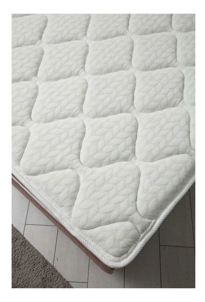 Boxspring posteľ 140 cm Vassilium (ružová)